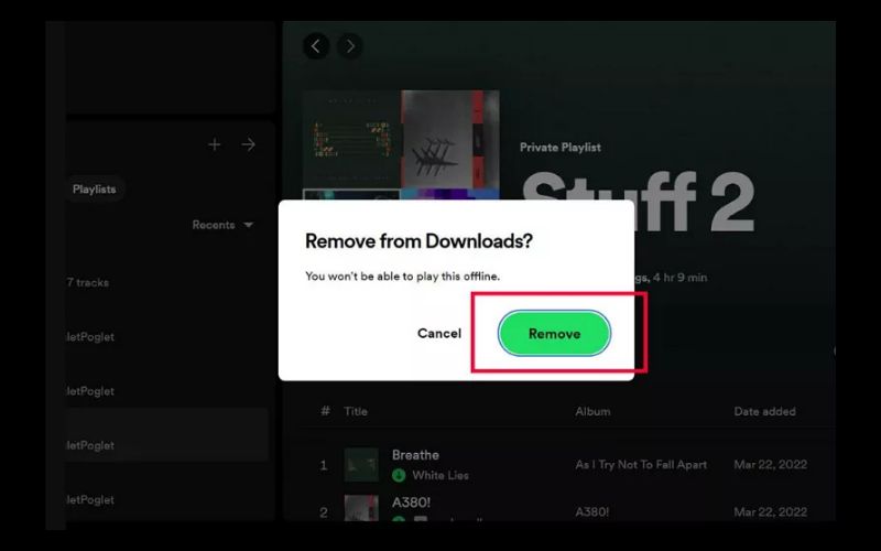 click green download arrow | Undownload Songs or Playlists on Spotify